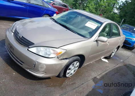 2002 Toyota Camry Le z USA, uszkodzony, nr VIN 4T1BE32K52U103917